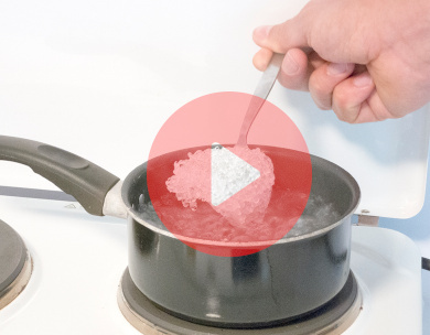 PCL plastic being pulled out of boiling water